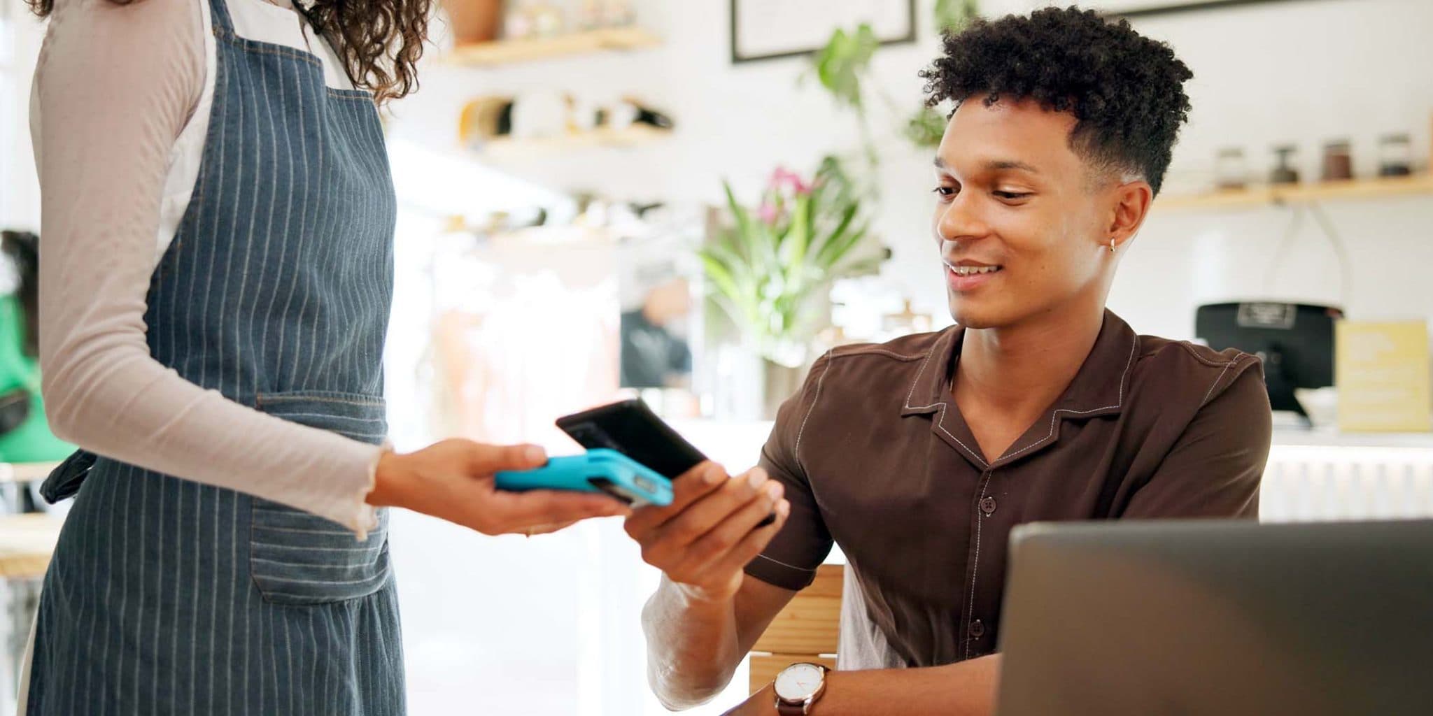 Customer completing an online payment from a mobile phone